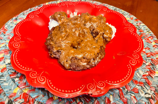 Country fried steak with mashed potatoes and gravy