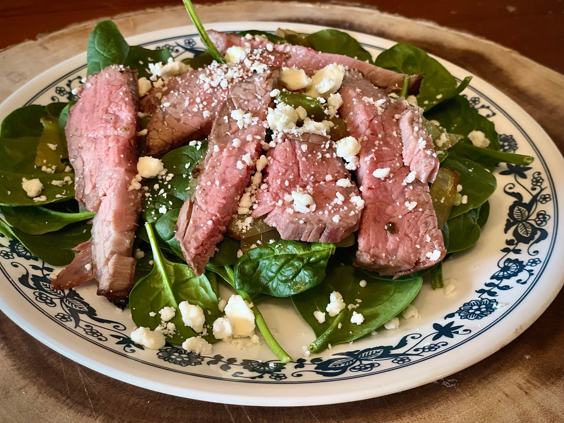 Grilled beef tri-tip salad with feta and vegetables