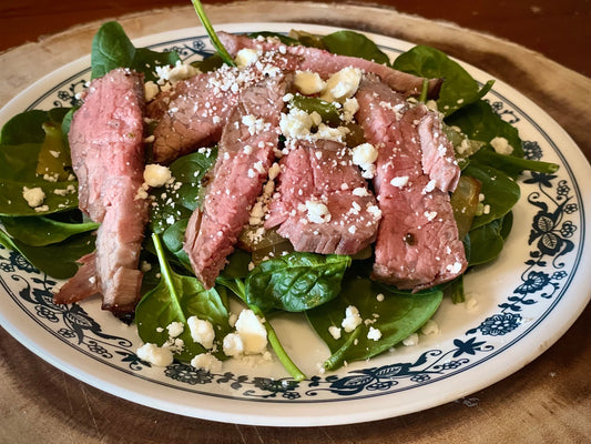 Grilled beef tri-tip salad with feta and vegetables